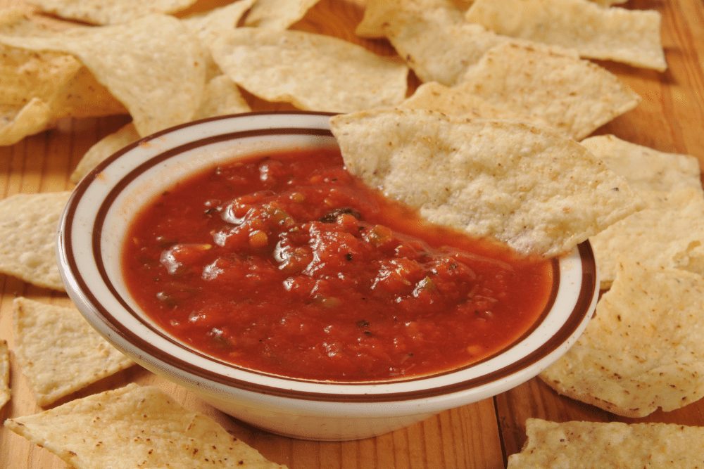 Salsa roja and tortilla chips. 