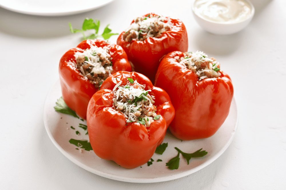 Mexibell Pepper: Spicy Bell Pepper Hybrid 3 Mexibell peppers stuffed with meat, rice, and cheese.